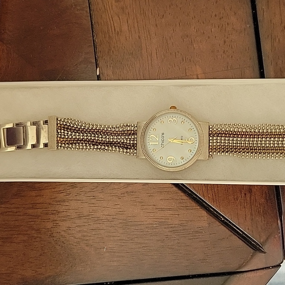 Chicos watch gold and silver. Never worn. New Battery. Beaded braclet.